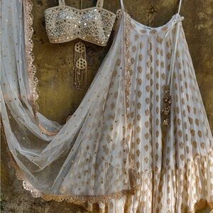 Gold Indian lengha worn once for a wedding event excellent condition